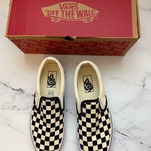 Vans Black & White Checkerboard Slip-On Sneakers